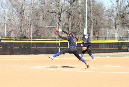 Jacquelyne Howard delivering the pitch to the batter.